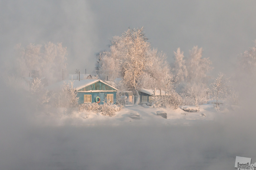 За рекой.