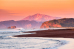Восход солнца на Халактырском пляже, на заднем плане вулкан Мутновский
